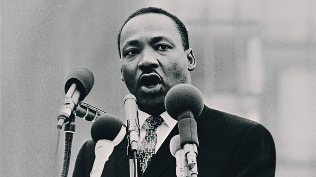 Illustration for article titled 16 Pictures Of Martin Luther King Jr. Sprinting Through Times Square